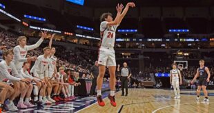 Mateo Cortes Weiss shoots for three during the state final game against Albany on March 25, 2023. (Photo by Ezra Victor.)