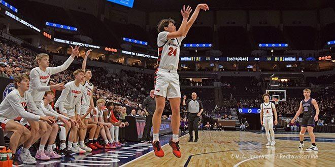 Mateo Cortes Weiss shoots for three during the state final game against Albany on March 25, 2023. (Photo by Ezra Victor.)