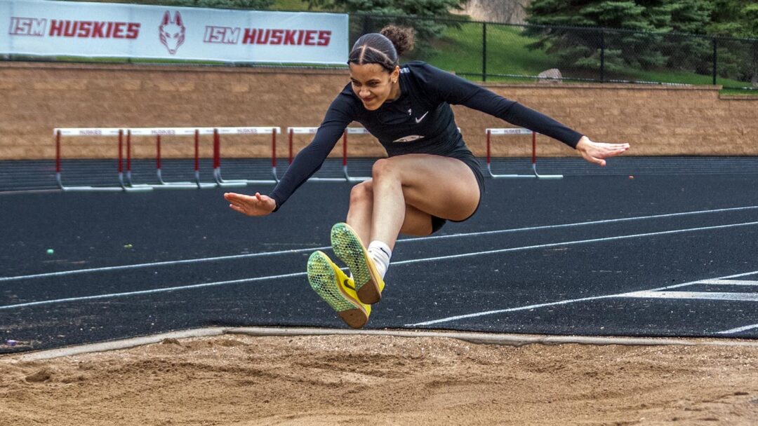 Junior Grazina Troup competes at the 4.23.24 Gryphon Invitational Meet. She went on to win the Class AA state title in triple jump. Photo by Ezra Victor.