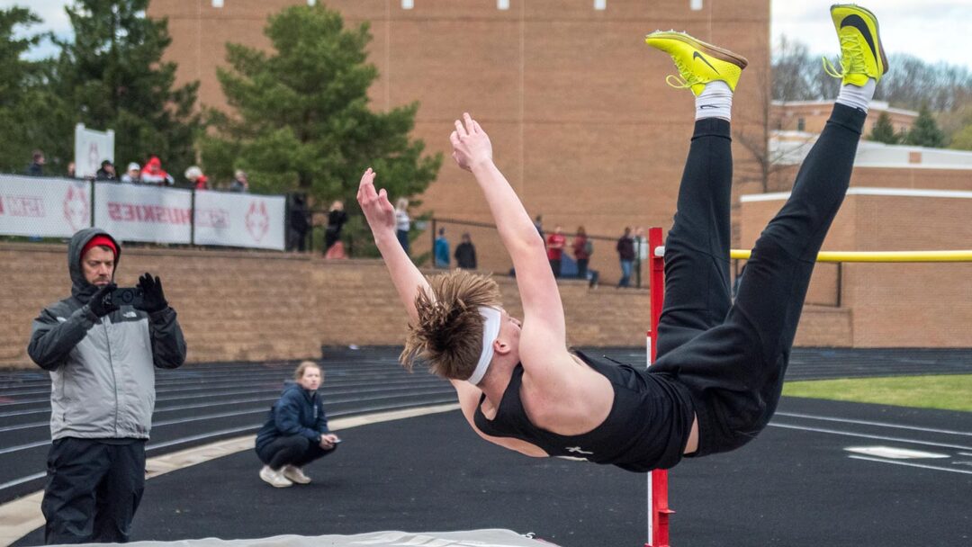 May clears the bar. Photo by Ezra Victor.