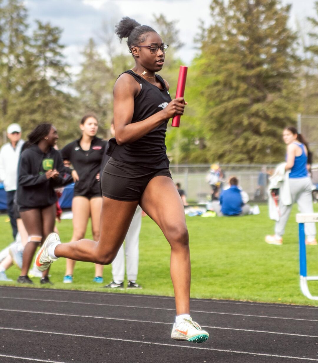 M.A. girls set school records in 4 x 200 and 4 x 400 and were also successful in 4 x 100 and 4 x 800. Photo by Ezra Victor.